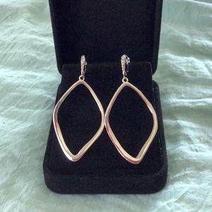 Alexis Bittar white gold tone earrings.